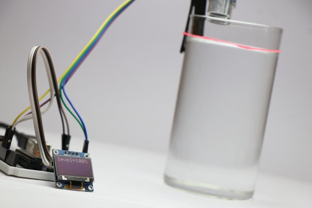 Arduino Water Level Indicator Using Ultrasonic Sensor And Oled